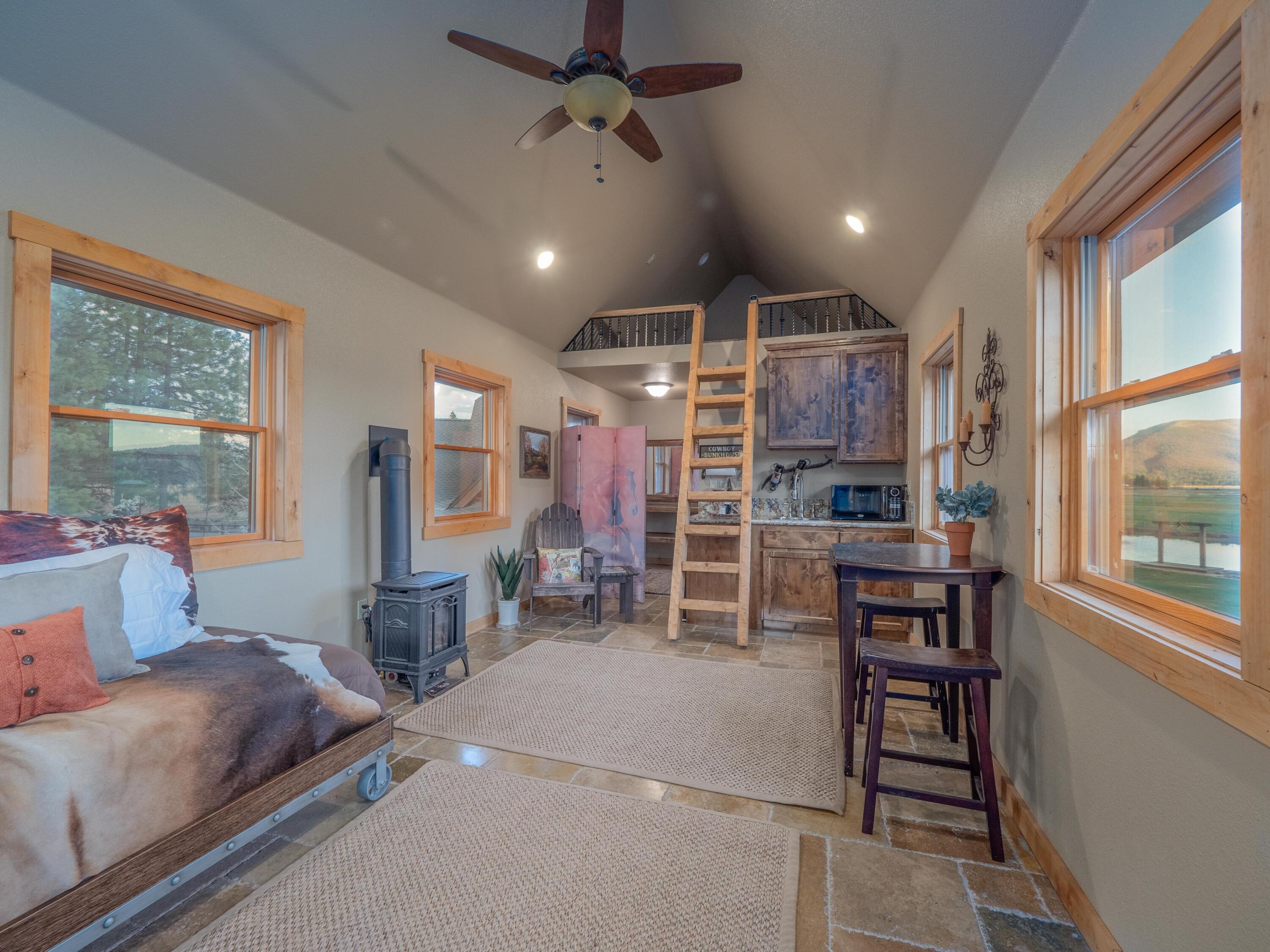 40900 Brown Road Fall River Mills, CA 96028 - Photo 51 of 72 a bedroom with furniture and a window