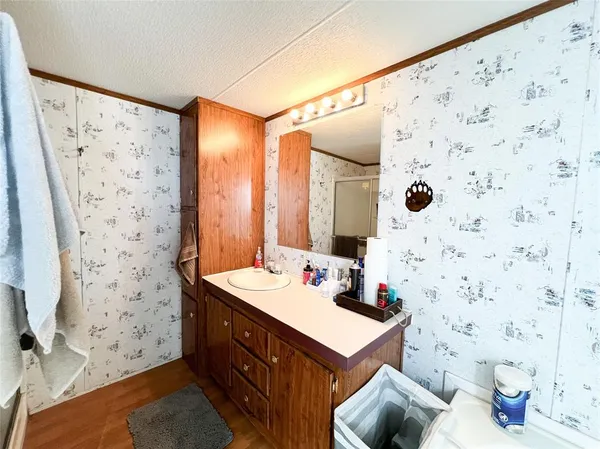 a bathroom with a toilet sink and bathtub