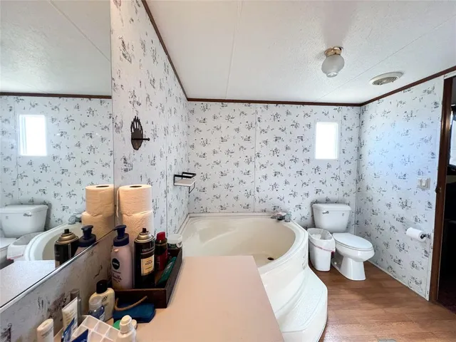 an aerial view of residential building and ocean view