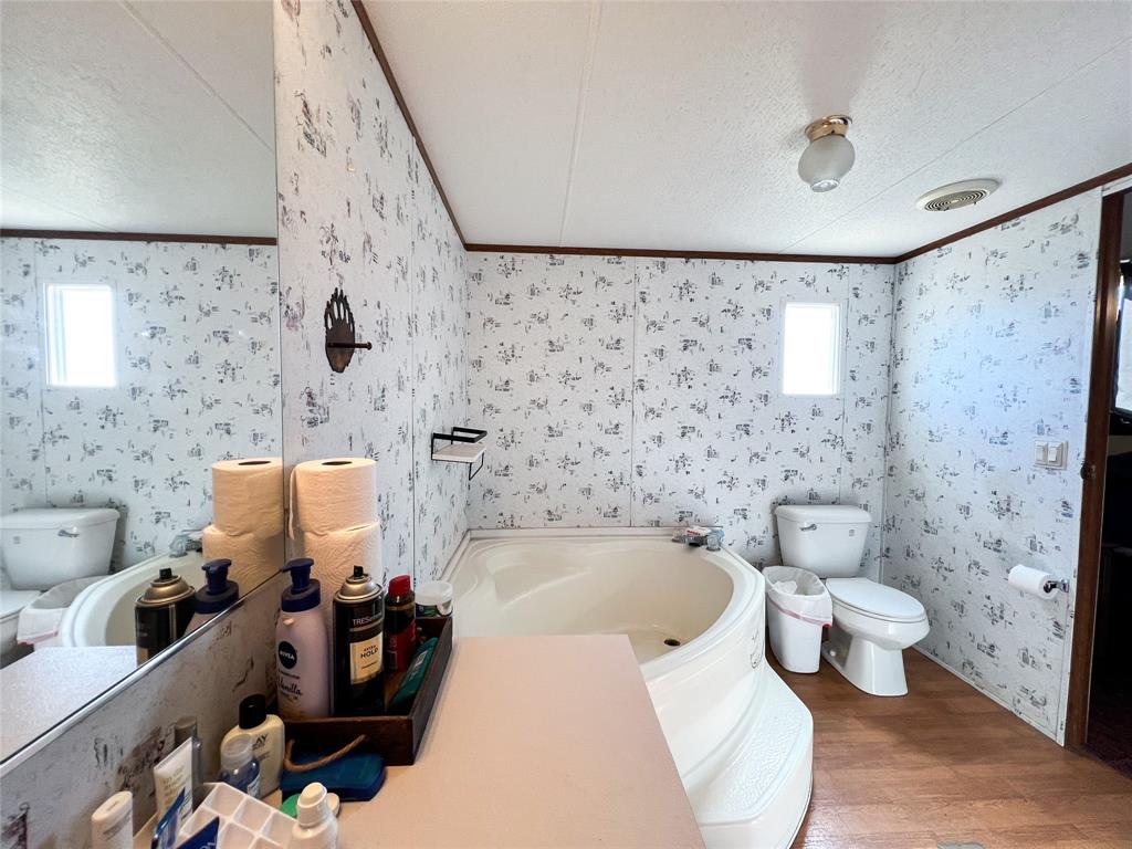 148 Rule Tx 79547 Rule, TX 79547 - Photo 17 of 39 a bathroom with a toilet sink and bathtub