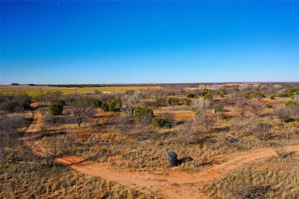 a view of a yard with an outdoor space