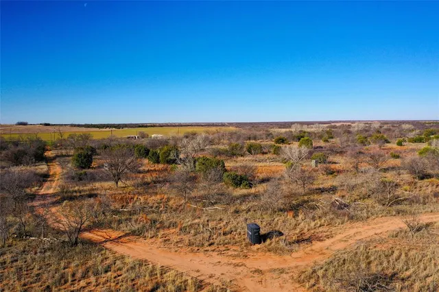 a view of a yard with an outdoor space