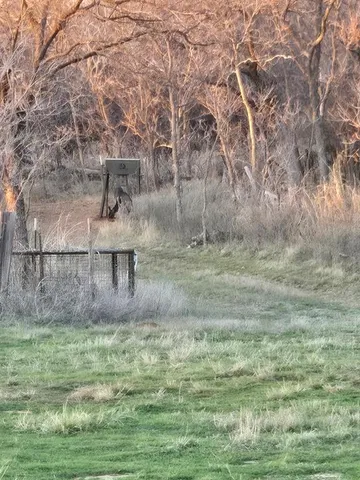 a view of kitchen island with a sink