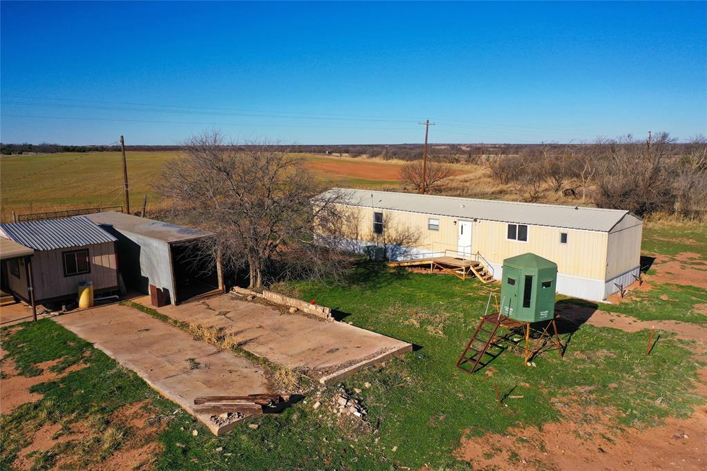 148 Rule Tx 79547 Rule, TX 79547 - Photo 5 of 39 an aerial view of a house having yard