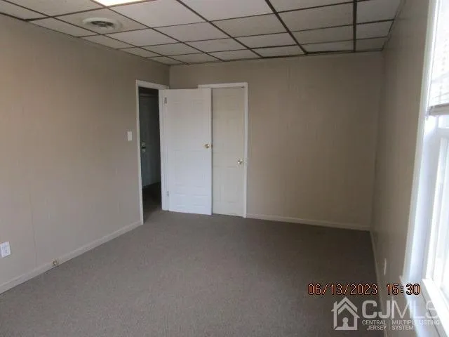 a bathroom with a bathtub and a toilet
