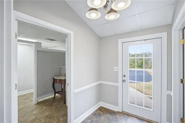 a view of yard with large trees