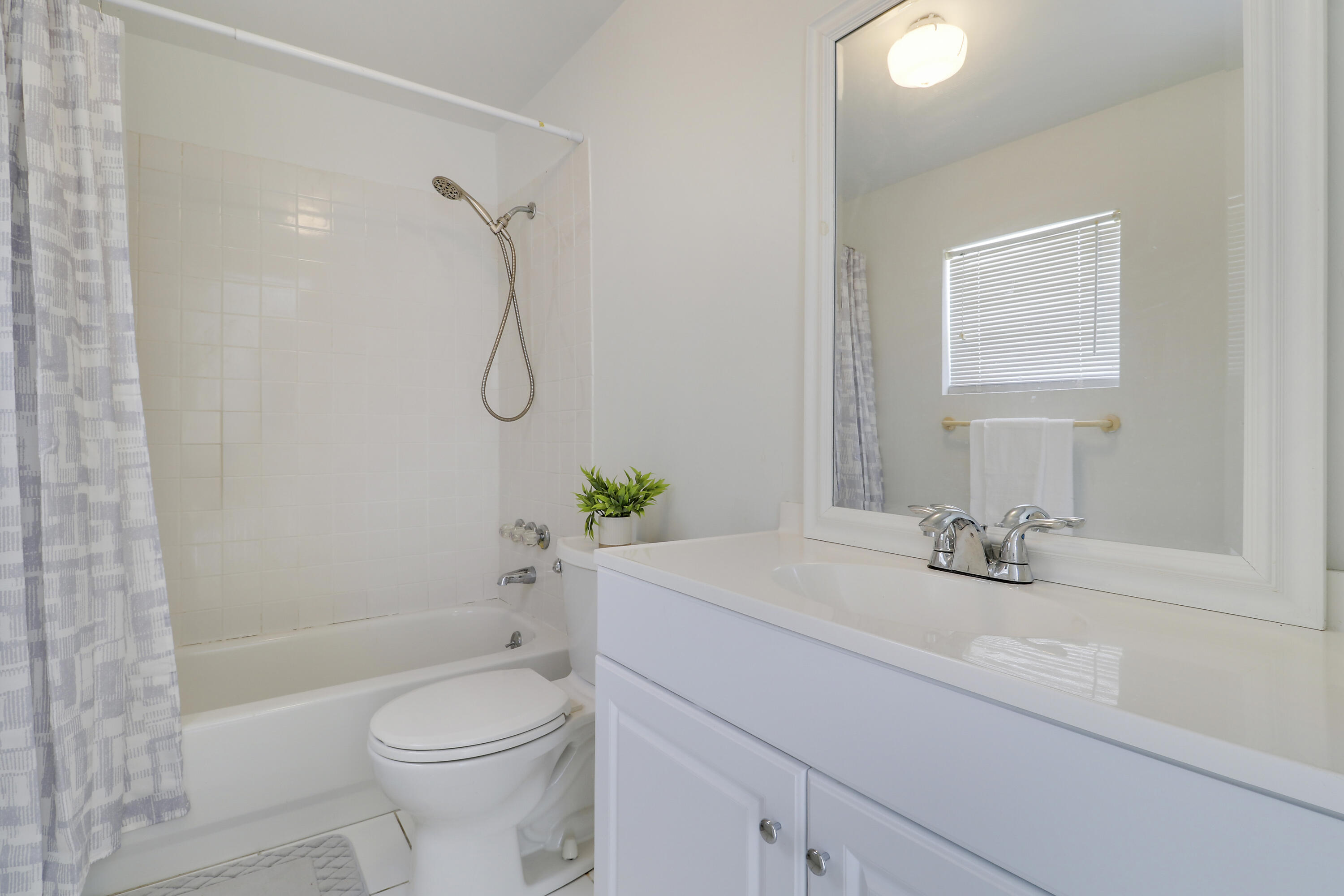 5519 Columbus Road West Palm Beach, FL 33405 - Photo 11 of 22 a bathroom with a sink a toilet and shower