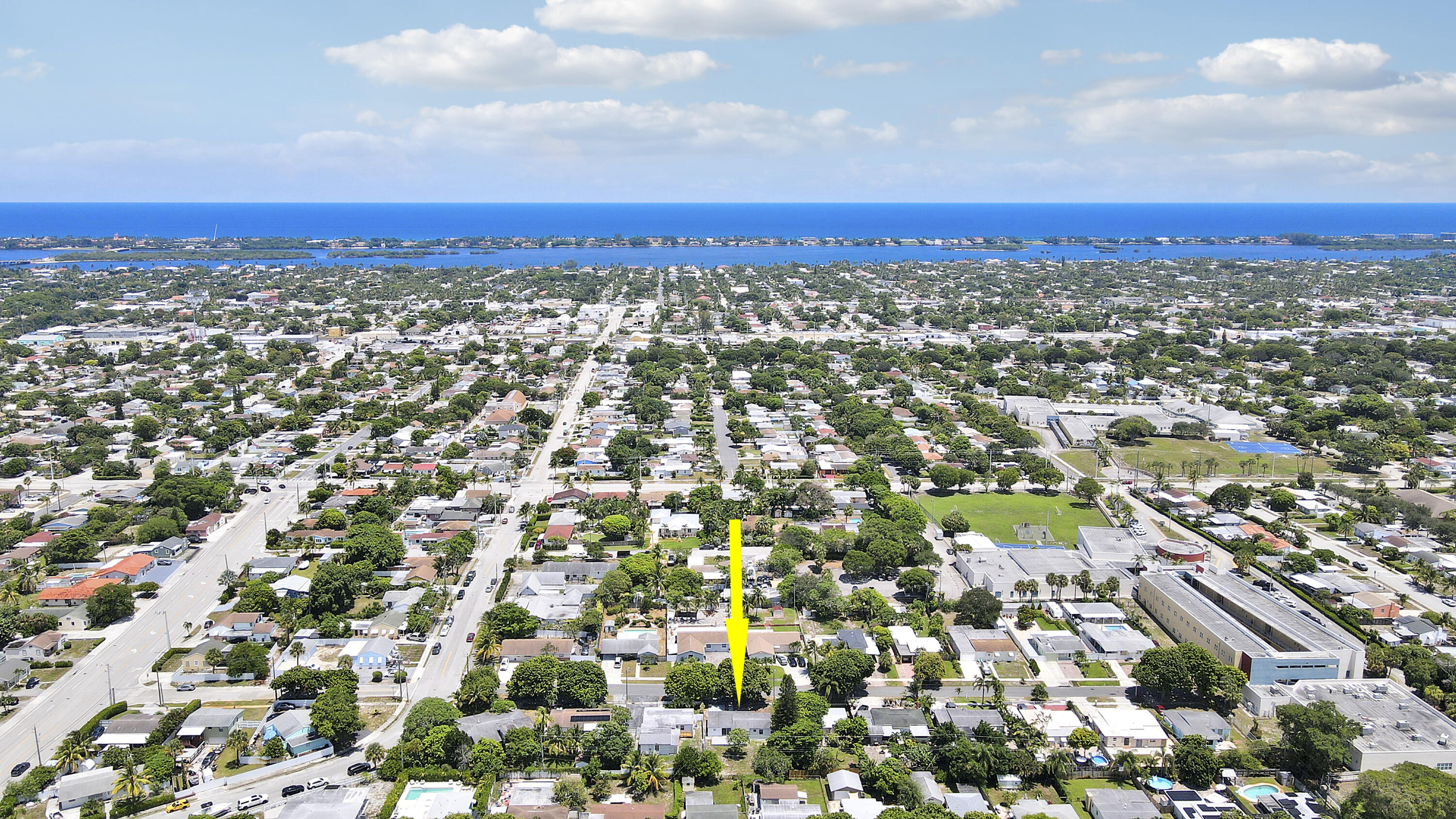 5519 Columbus Road West Palm Beach, FL 33405 - Photo 17 of 22 an aerial view of residential houses with city view