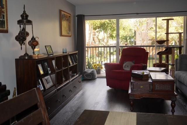 8871 Wiles Road, Unit 201 Coral Springs, FL 33067 - Photo 16 of 70 a living room with furniture and a window