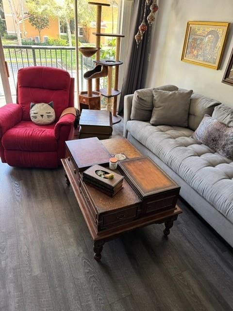 8871 Wiles Road, Unit 201 Coral Springs, FL 33067 - Photo 18 of 70 a living room with furniture and a window