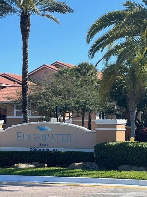 8871 Wiles Road, Unit 201 Coral Springs, FL 33067 - Photo 2 of 70 a view of a house with a yard