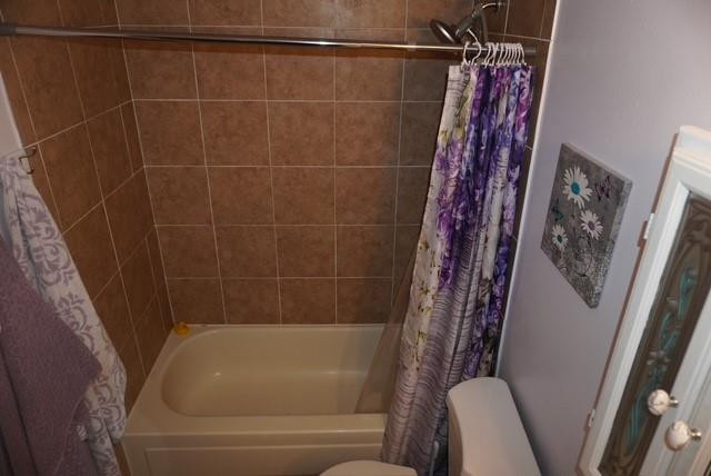 8871 Wiles Road, Unit 201 Coral Springs, FL 33067 - Photo 33 of 70 a bathroom with a bathtub and shower