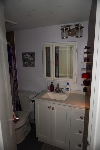 8871 Wiles Road, Unit 201 Coral Springs, FL 33067 - Photo 38 of 70 a bathroom with a sink toilet and shower