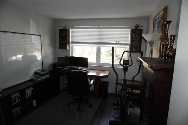 8871 Wiles Road, Unit 201 Coral Springs, FL 33067 - Photo 48 of 70 a view of a workspace with furniture and a window