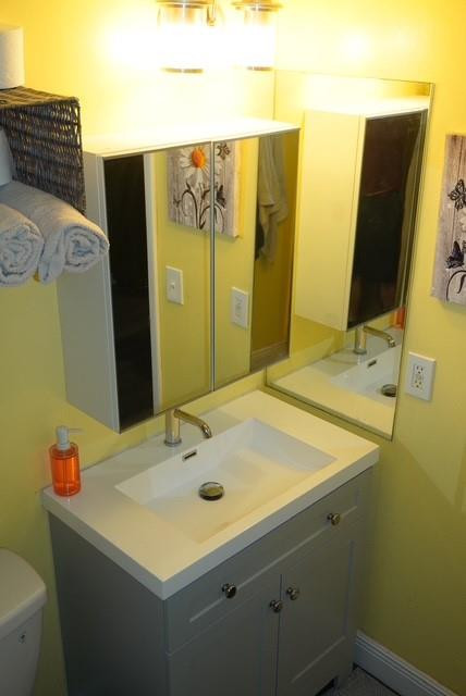 8871 Wiles Road, Unit 201 Coral Springs, FL 33067 - Photo 57 of 70 a bathroom with a sink and a mirror