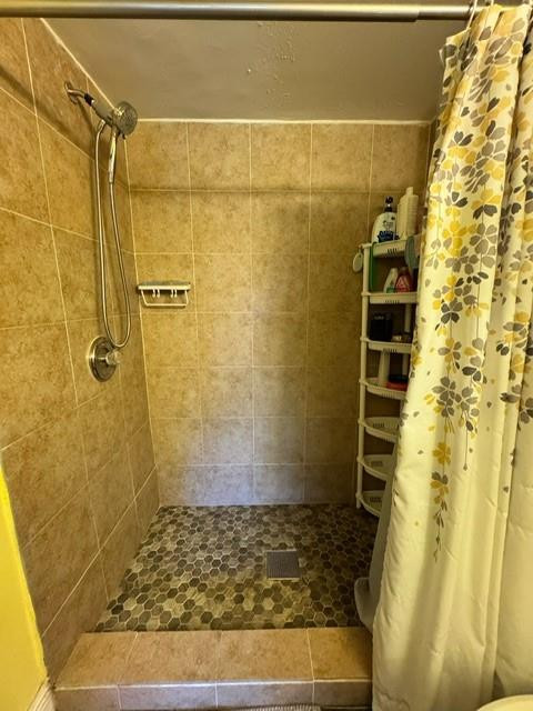 8871 Wiles Road, Unit 201 Coral Springs, FL 33067 - Photo 60 of 70 a bathroom with a shower