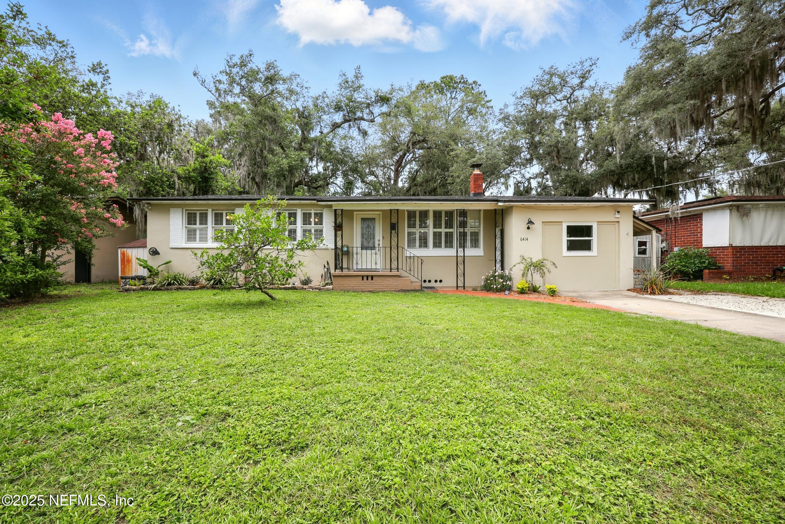 6414 Colgate Road Jacksonville, FL 32217 - Photo 2 of 33 a front view of house with yard and green space