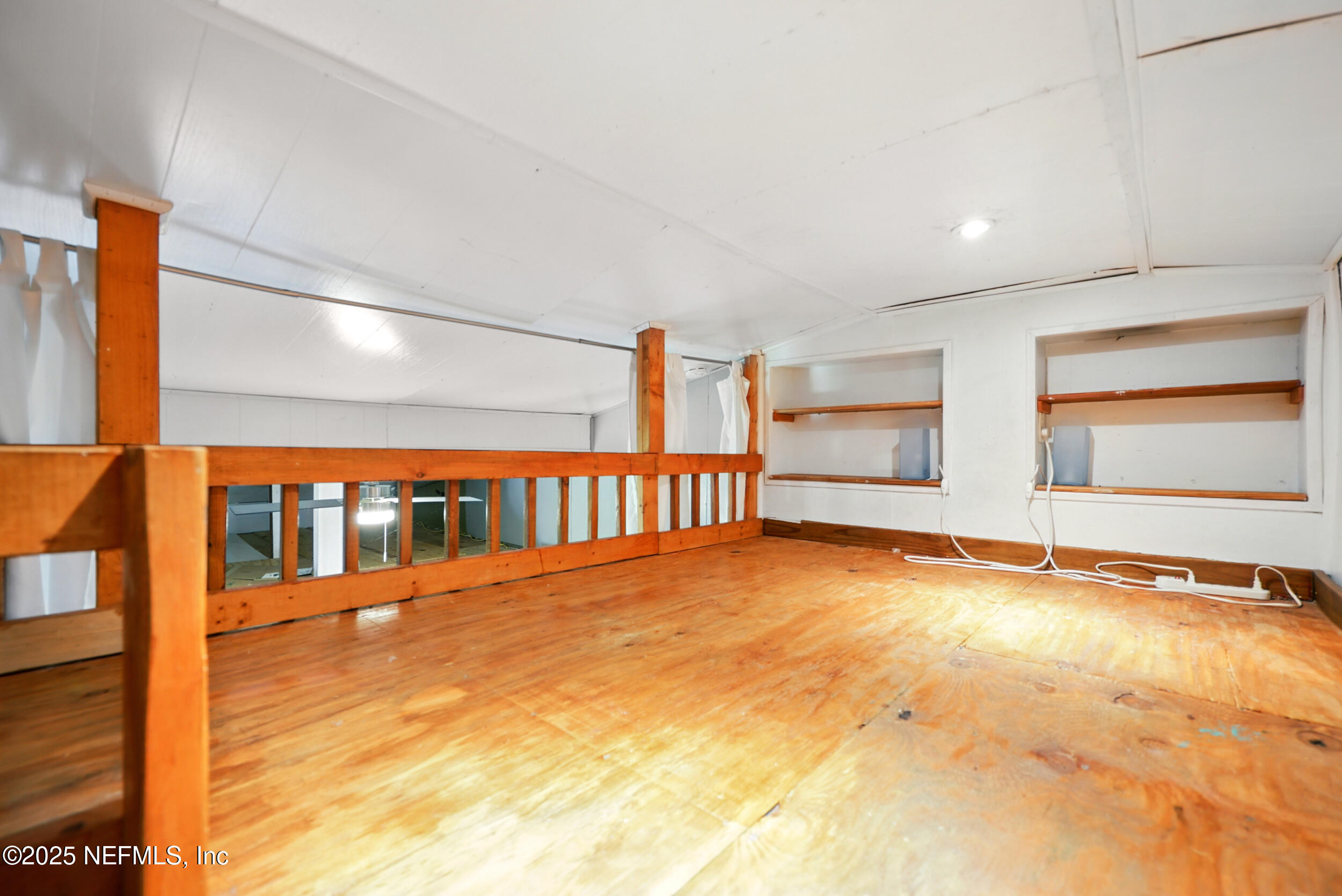 6414 Colgate Road Jacksonville, FL 32217 - Photo 21 of 33 a view of an empty room with windows