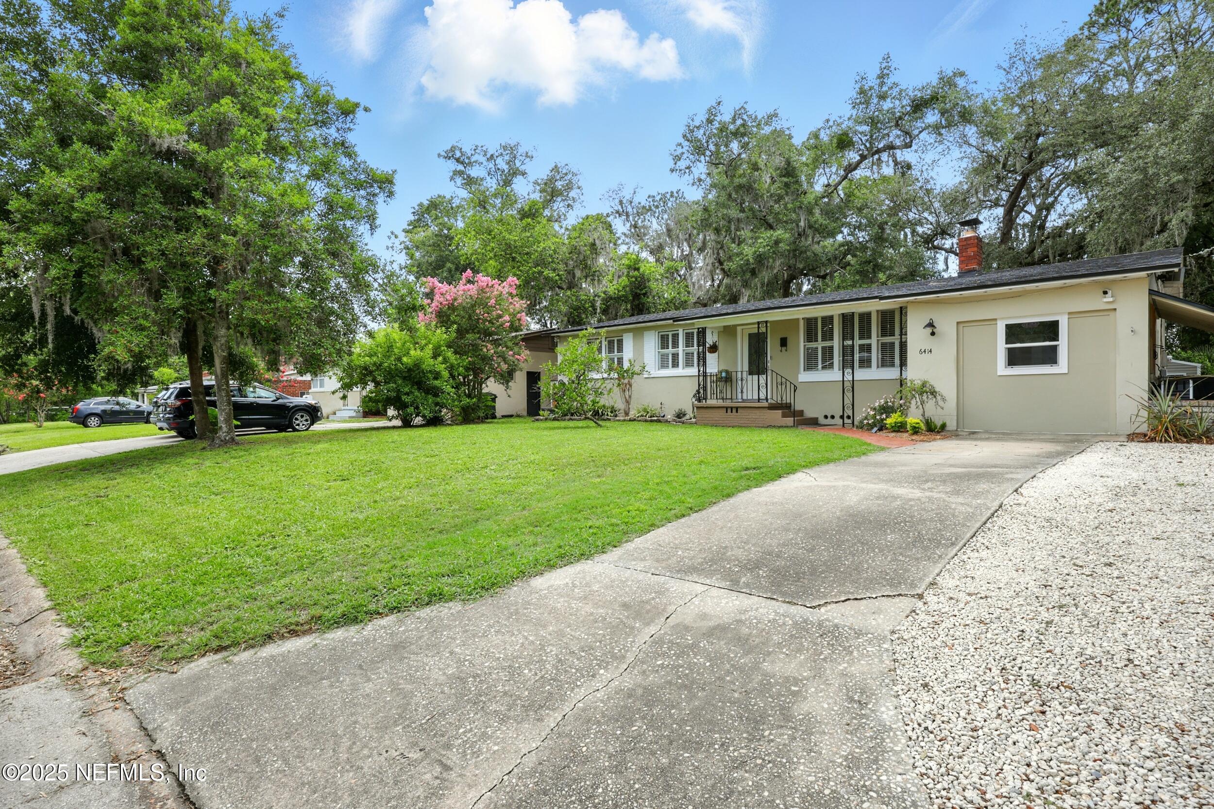 6414 Colgate Road Jacksonville, FL 32217 - Photo 32 of 33 a front view of house with yard and green space
