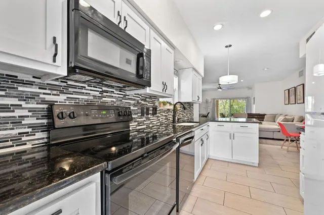 a view of a brick building with large windows