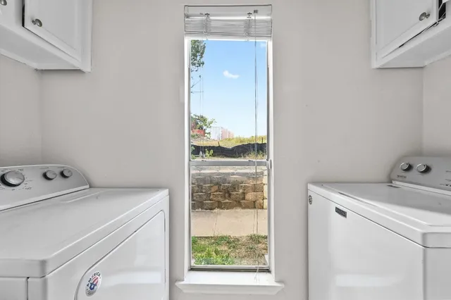 a kitchen with a stove and a microwave