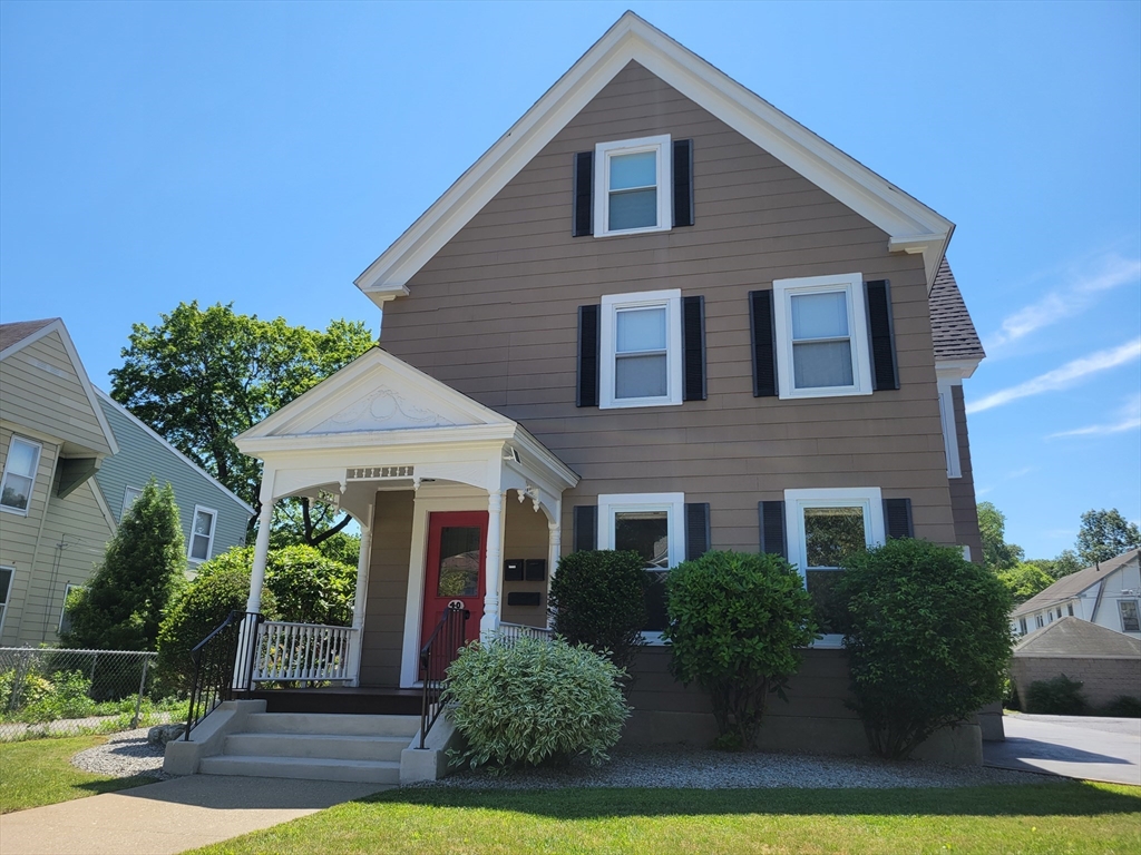 40 June Street Worcester, MA 01602 - Photo 1 of 28 a front view of a house with garden