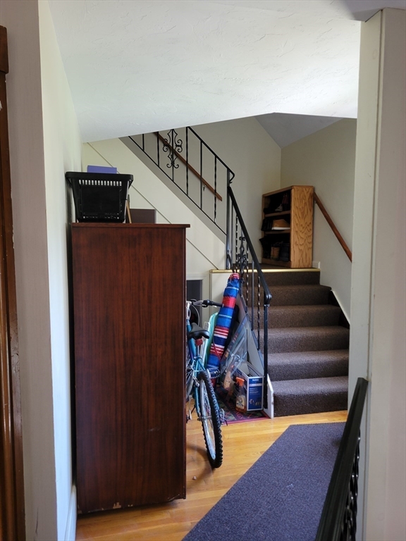 40 June Street Worcester, MA 01602 - Photo 12 of 28 a view of entryway and hall with wooden floor