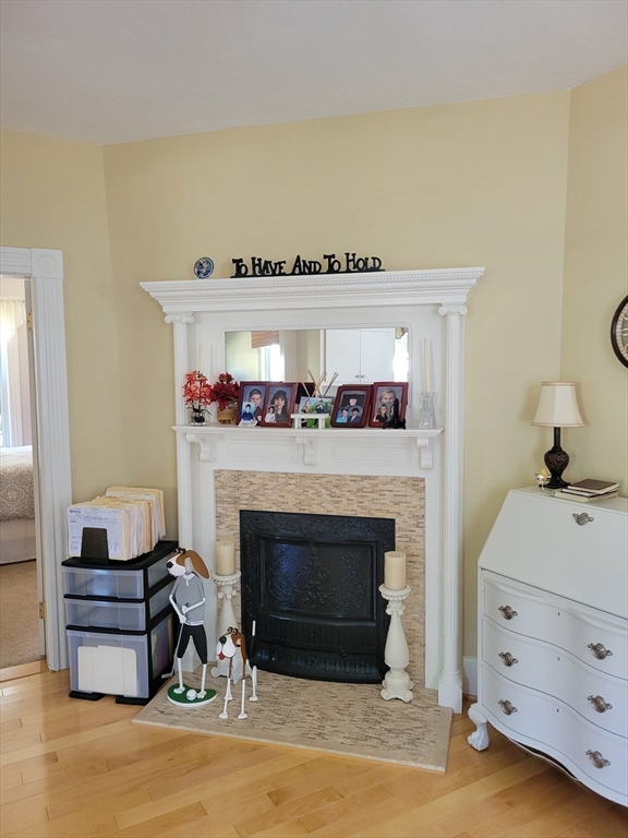 40 June Street Worcester, MA 01602 - Photo 15 of 28 a living room with furniture and a fireplace
