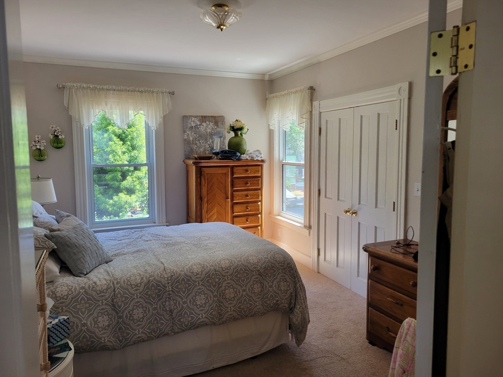 40 June Street Worcester, MA 01602 - Photo 16 of 28 a bedroom with a bed and a window
