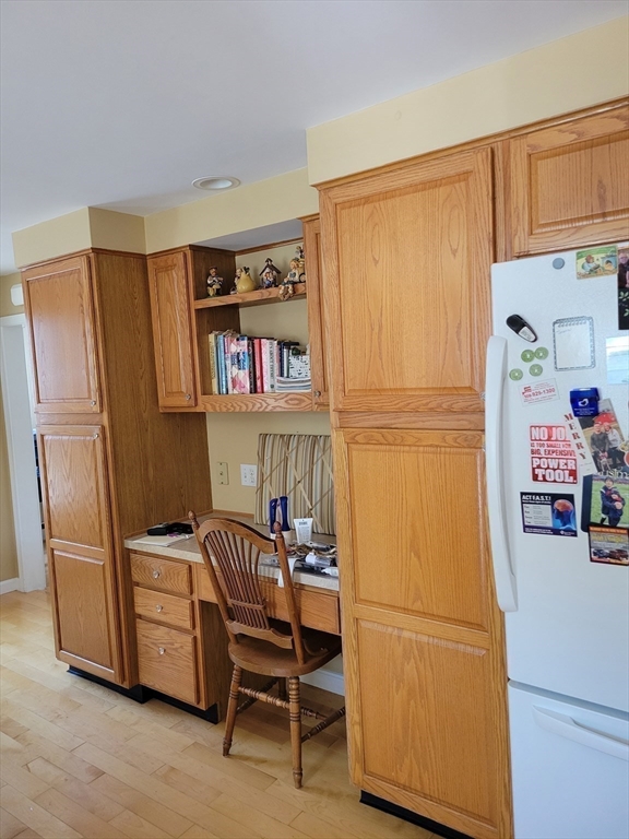 40 June Street Worcester, MA 01602 - Photo 20 of 28 a kitchen with stainless steel appliances granite countertop a refrigerator and a stove