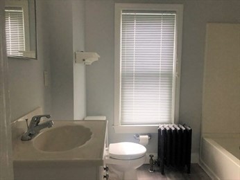 40 June Street Worcester, MA 01602 - Photo 22 of 28 a bathroom with a sink toilet and shower