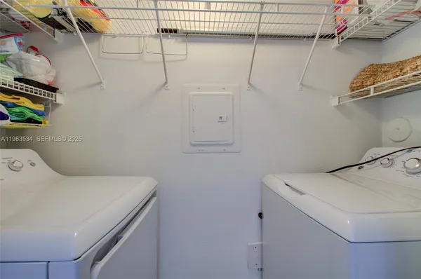 a utility room with dryer and washer