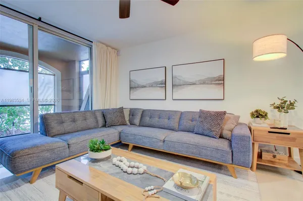 a living room with furniture and a couch