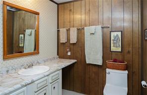 361 Lagoon Lane Silverthorne, CO 80498 - Photo 17 of 24 a bathroom with a granite countertop sink and a mirror