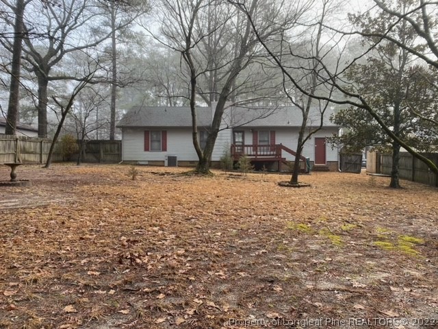 1750 Rim Road Fayetteville, NC 28314 - Photo 21 of 22 a tree in the middle of a yard