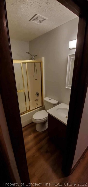 1750 Rim Road Fayetteville, NC 28314 - Photo 10 of 22 a bathroom with a sink a toilet a mirror and shower