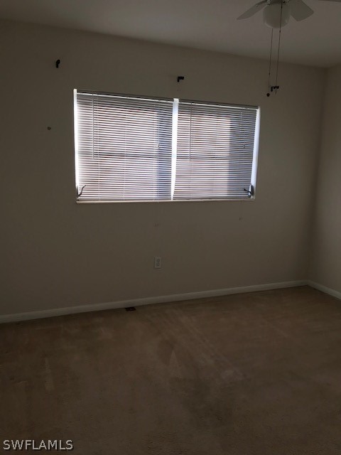 18624 Flamingo Road Fort Myers, FL 33967 - Photo 3 of 6 an empty room with a window