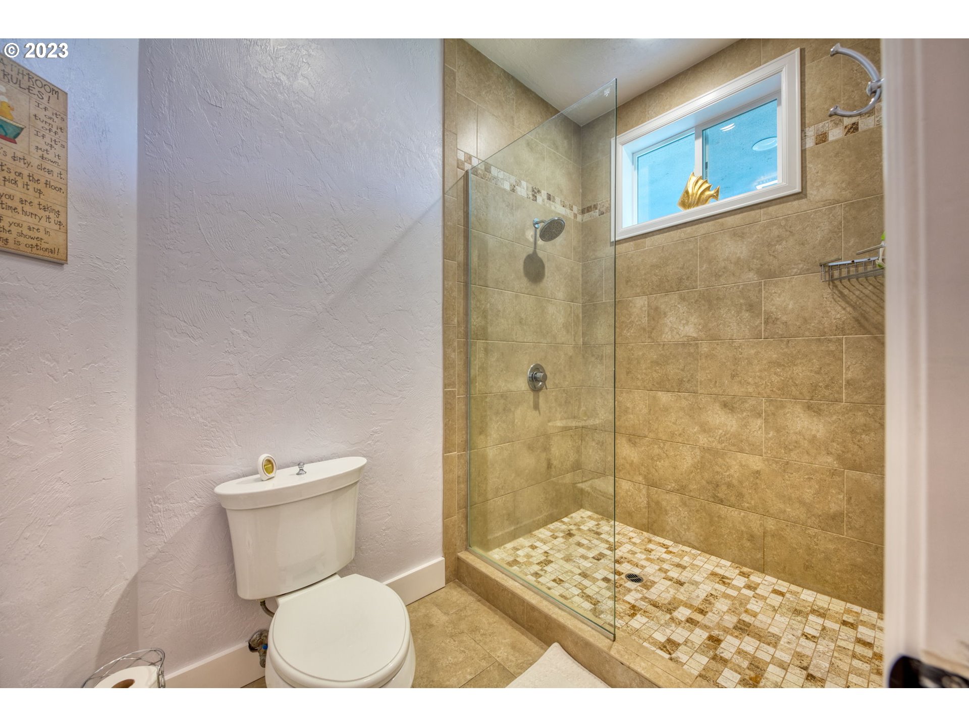315 Ayres Road Eugene, OR 97408 - Photo 22 of 31 a bathroom with a toilet and a shower