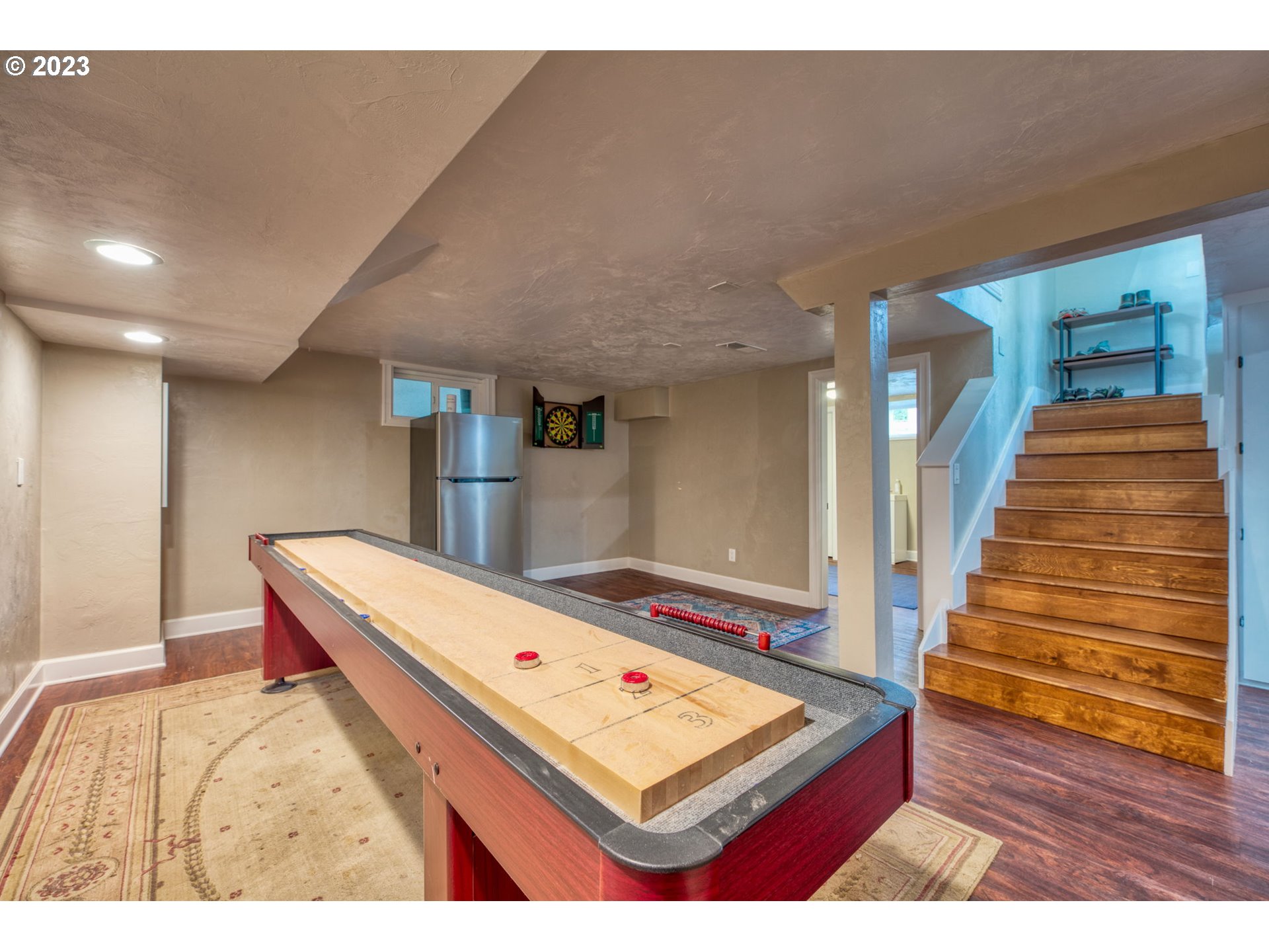 315 Ayres Road Eugene, OR 97408 - Photo 26 of 31 a bedroom with a bed and wooden floor