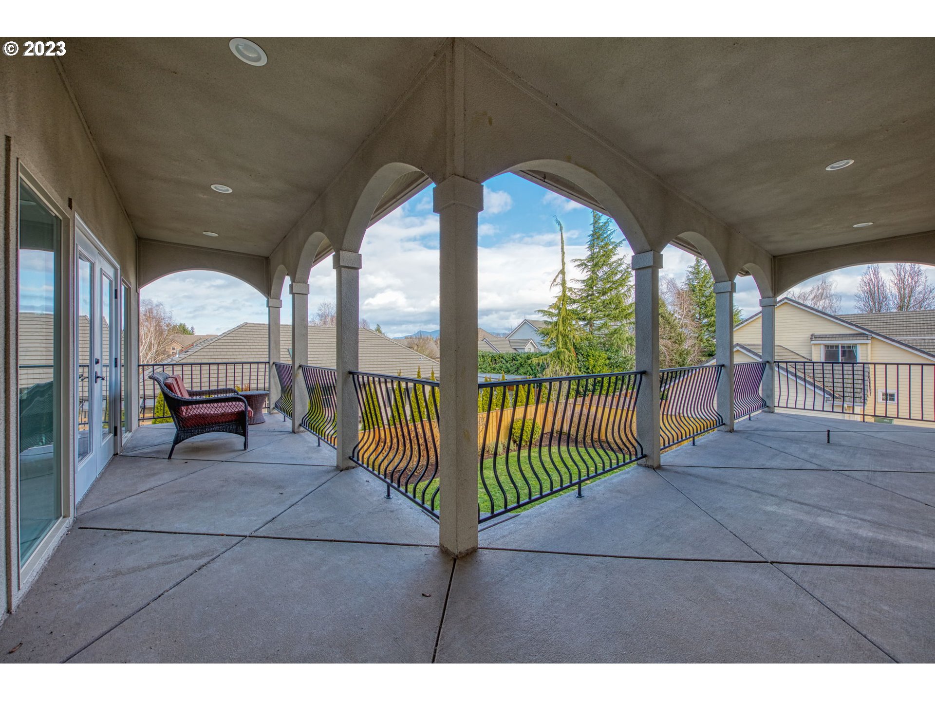 315 Ayres Road Eugene, OR 97408 - Photo 29 of 31 a view of a porch with wooden floor and outdoor seating