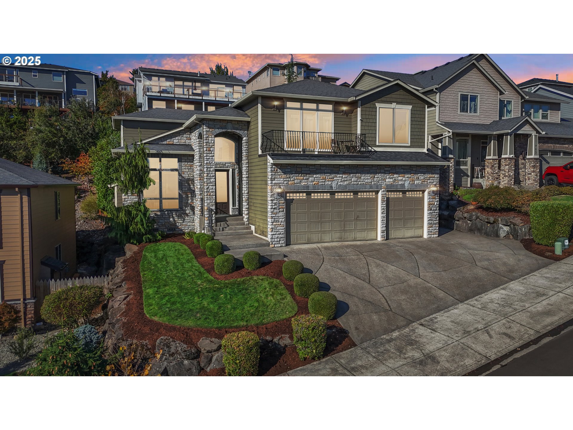 a front view of a house with a yard