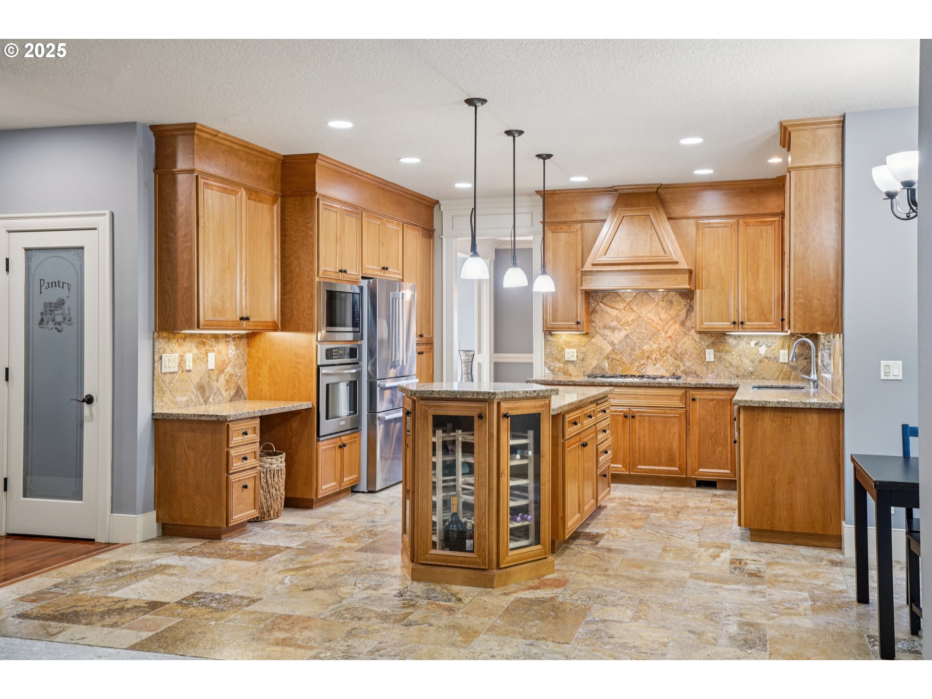 795 West X Street Washougal, WA 98671 - Photo 13 of 41 a kitchen with kitchen island granite countertop a sink cabinets and stainless steel appliances