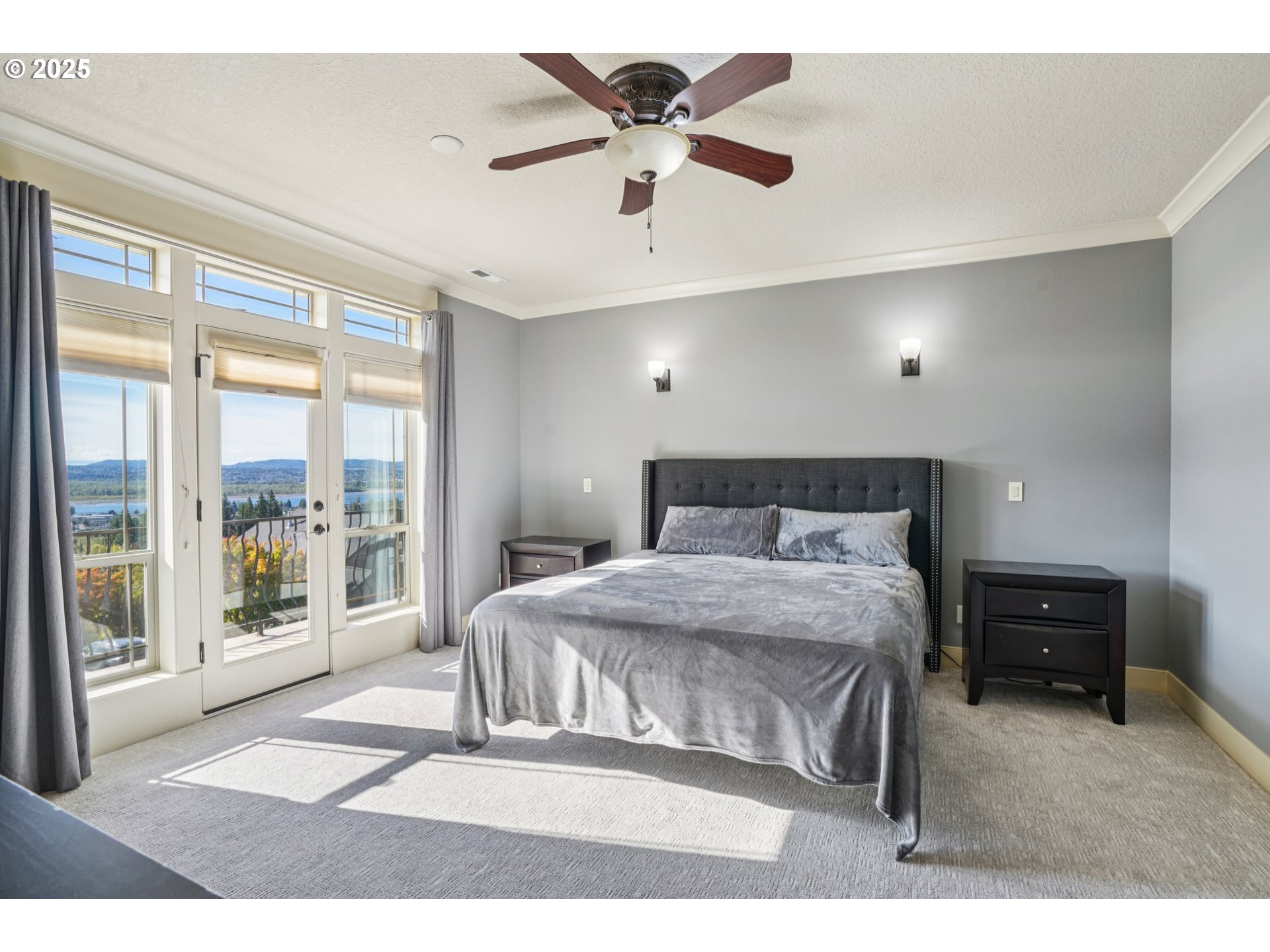 795 West X Street Washougal, WA 98671 - Photo 18 of 41 a bedroom with a large bed and a large window