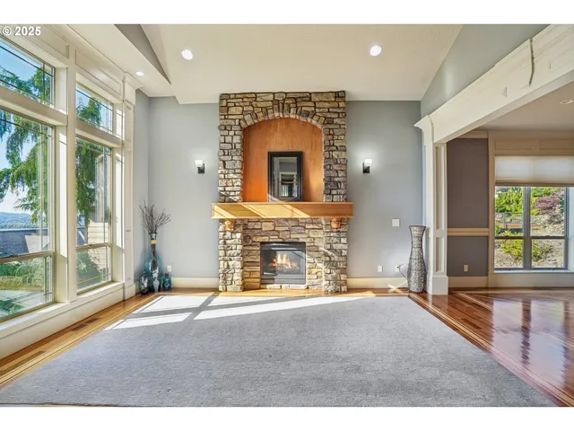 a view of livingroom with fireplace and window