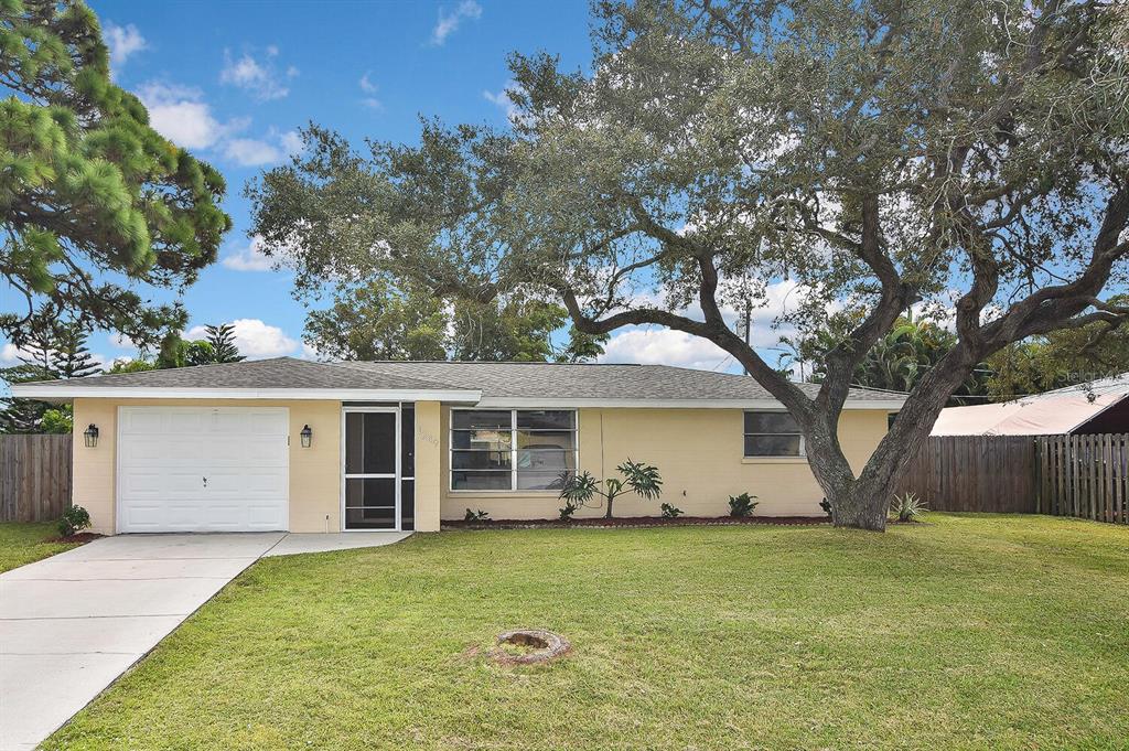 1249 Olympia Road Venice, FL 34293 - Photo 1 of 1 a view of a house with backyard