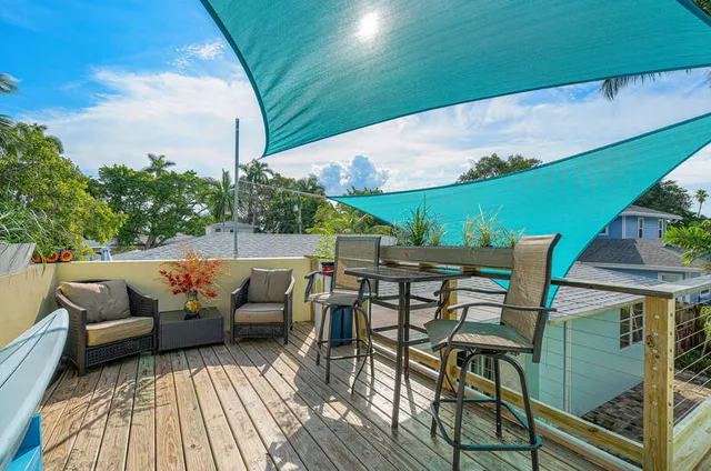 swimming pool view with a seating space