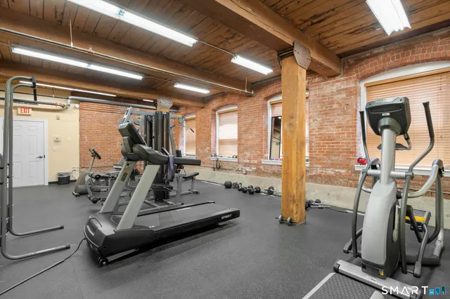 a view of a room with gym equipment