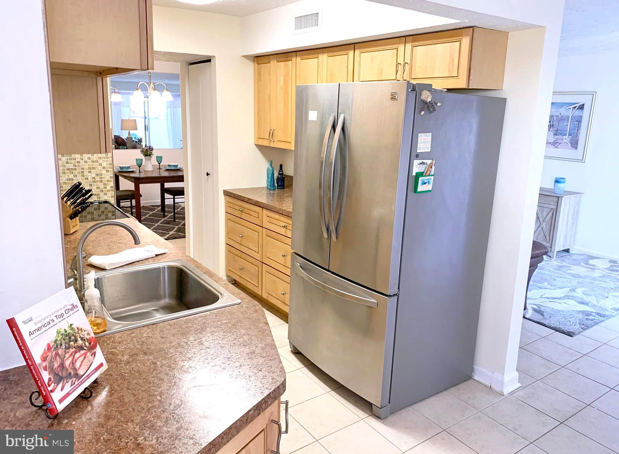 8011 Mandan Road, Unit 503 Greenbelt, MD 20770 - Photo 11 of 25 Updated Cabinets and Custom Backsplash