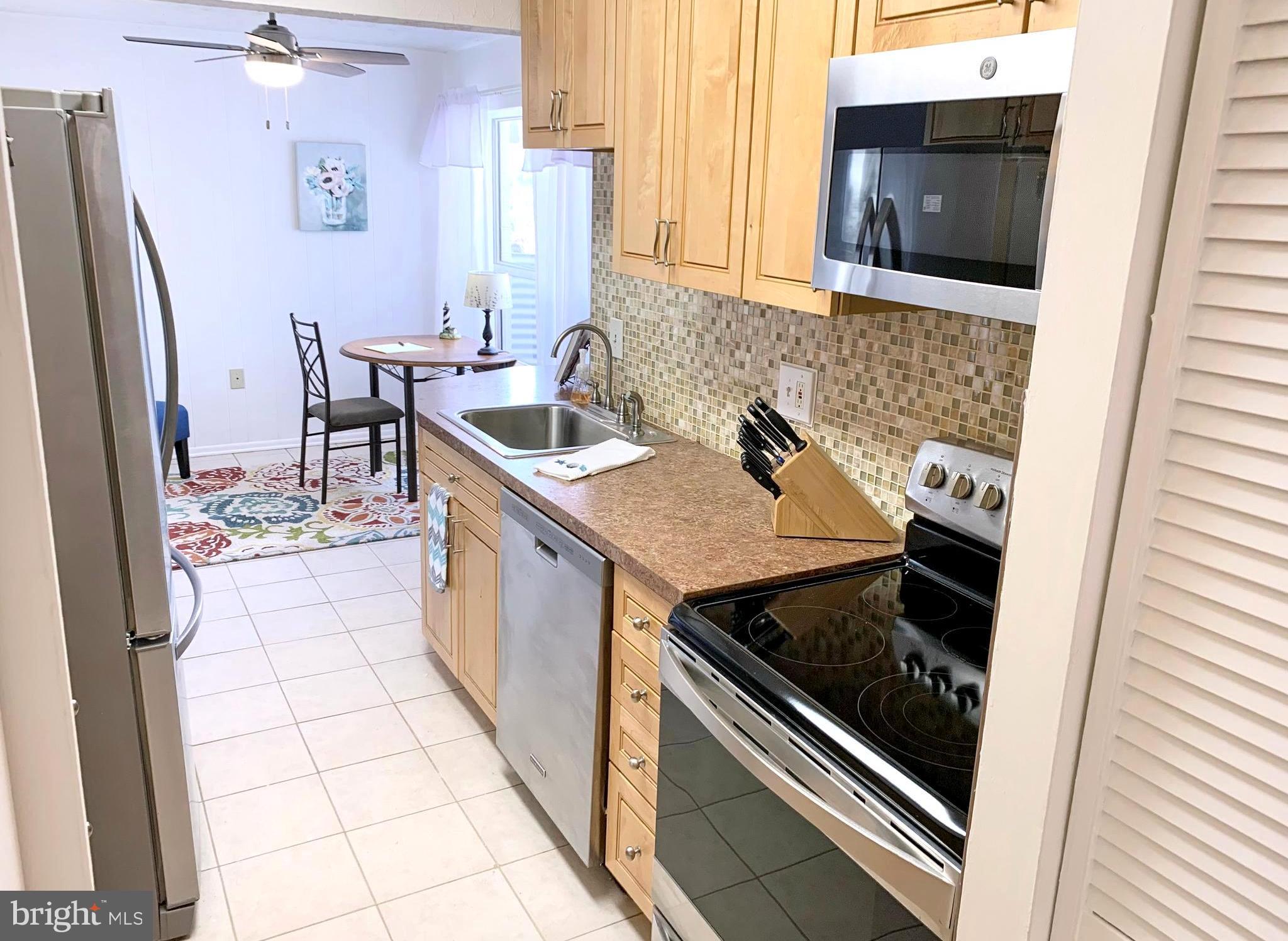 8011 Mandan Road, Unit 503 Greenbelt, MD 20770 - Photo 10 of 25 Updated Kitchen with Stainless Appliances