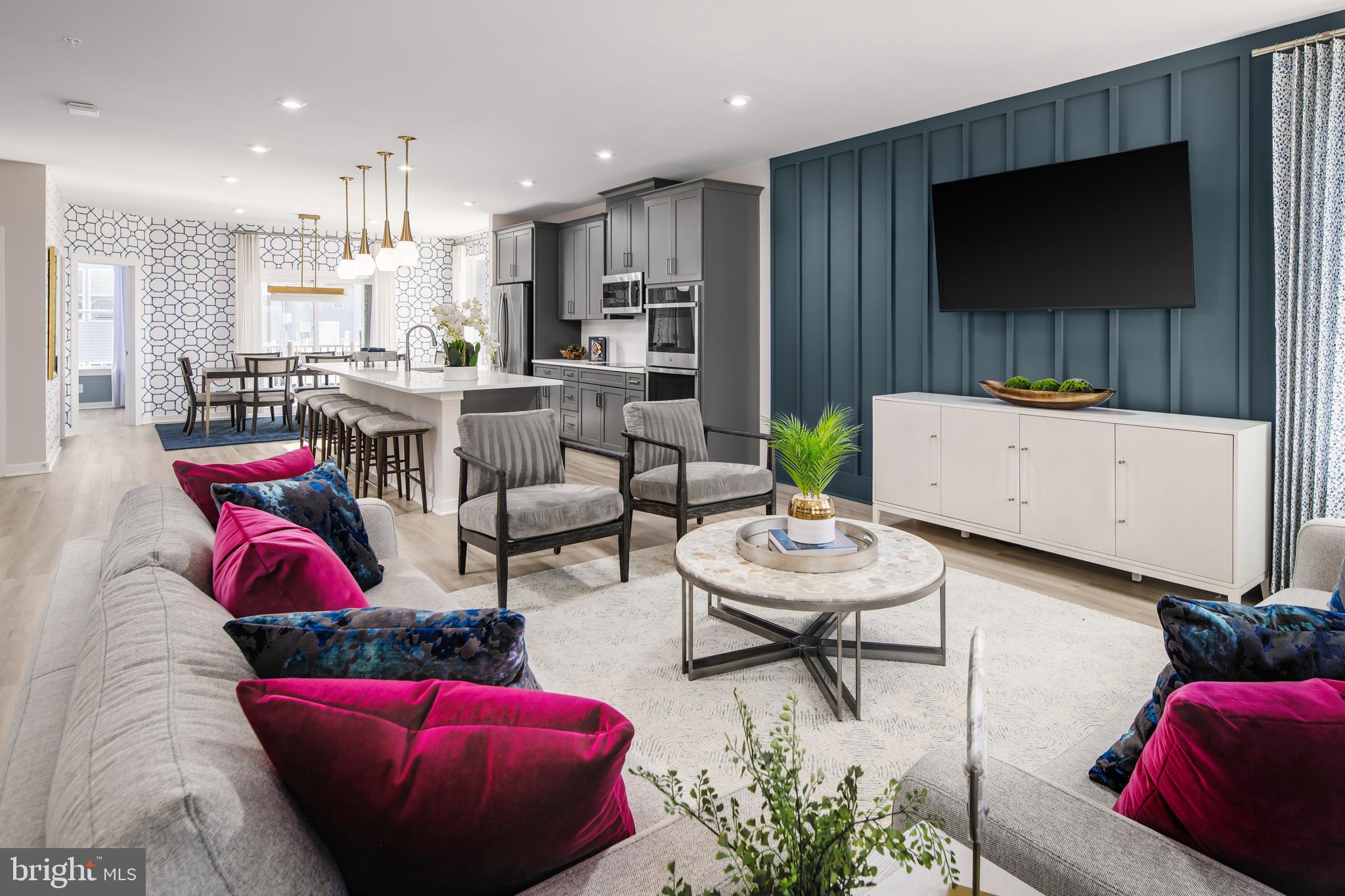 2167 Glacier Road Herndon, VA 20170 - Photo 4 of 32 a living room with furniture and a flat screen tv